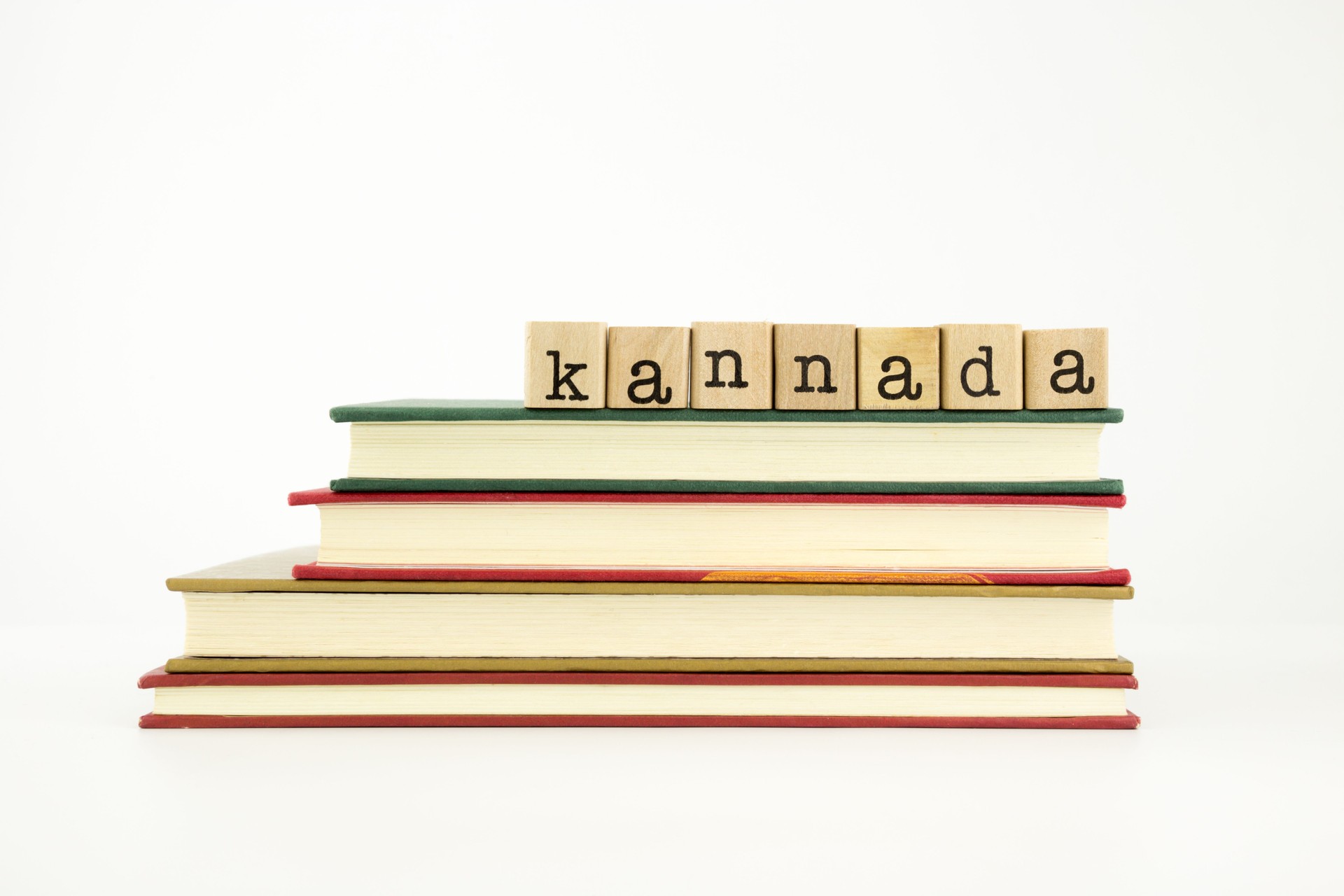 Kannada language word on wood stamps and books